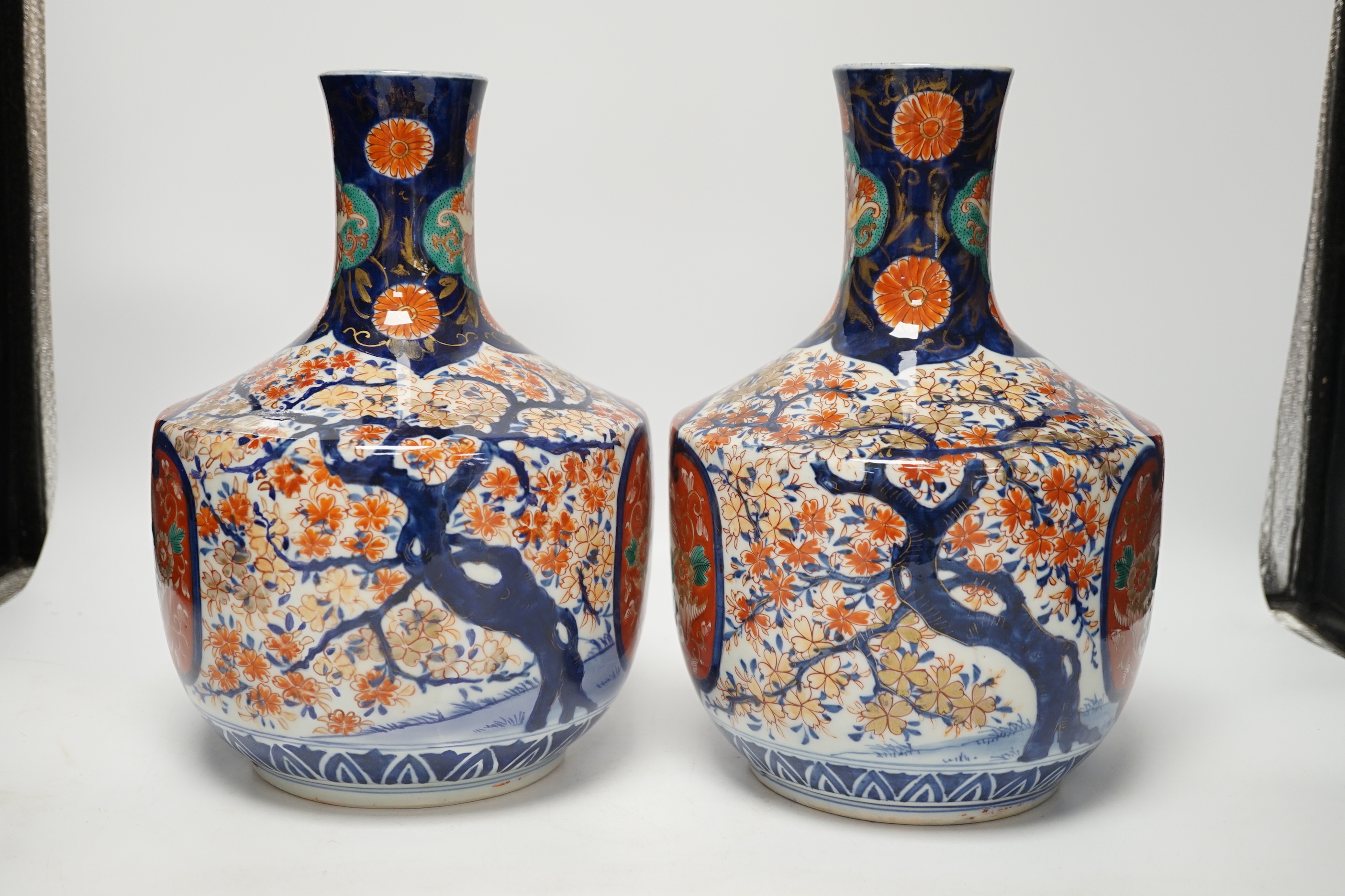 A pair of Japanese Imari vases, Meiji period, ink label to one base, 29cm high